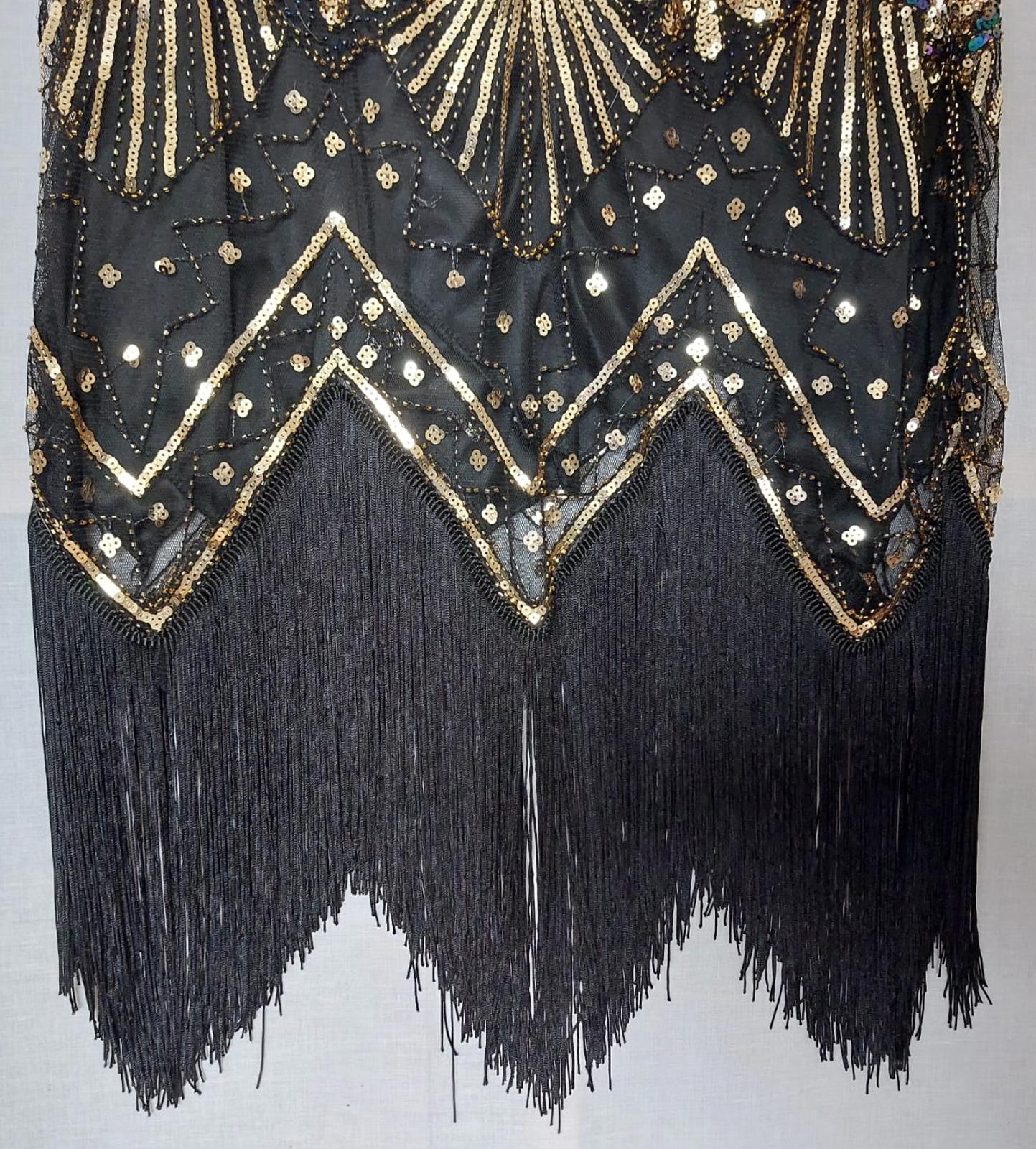 Dress 12/14 Black with Sequins V-Neck Fully Lined Tasselled Hem BNWOT